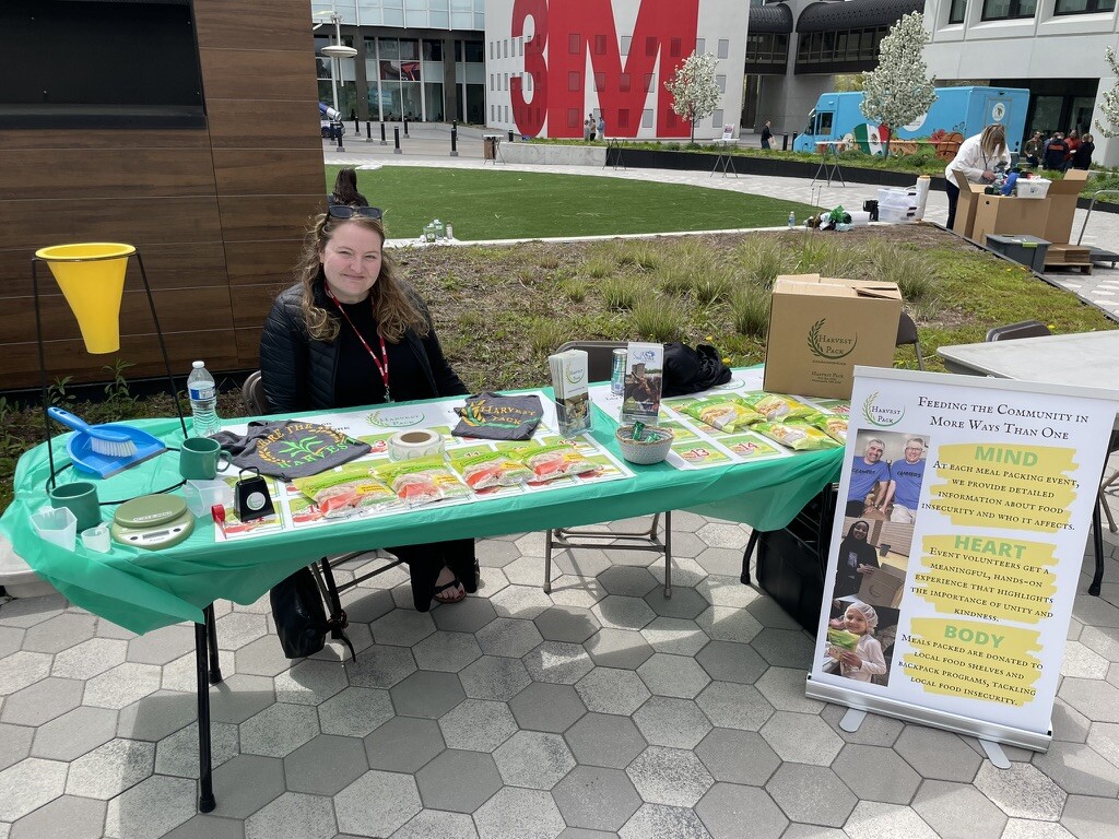 Harvest Pack member at 3M Experience volunteer fair.